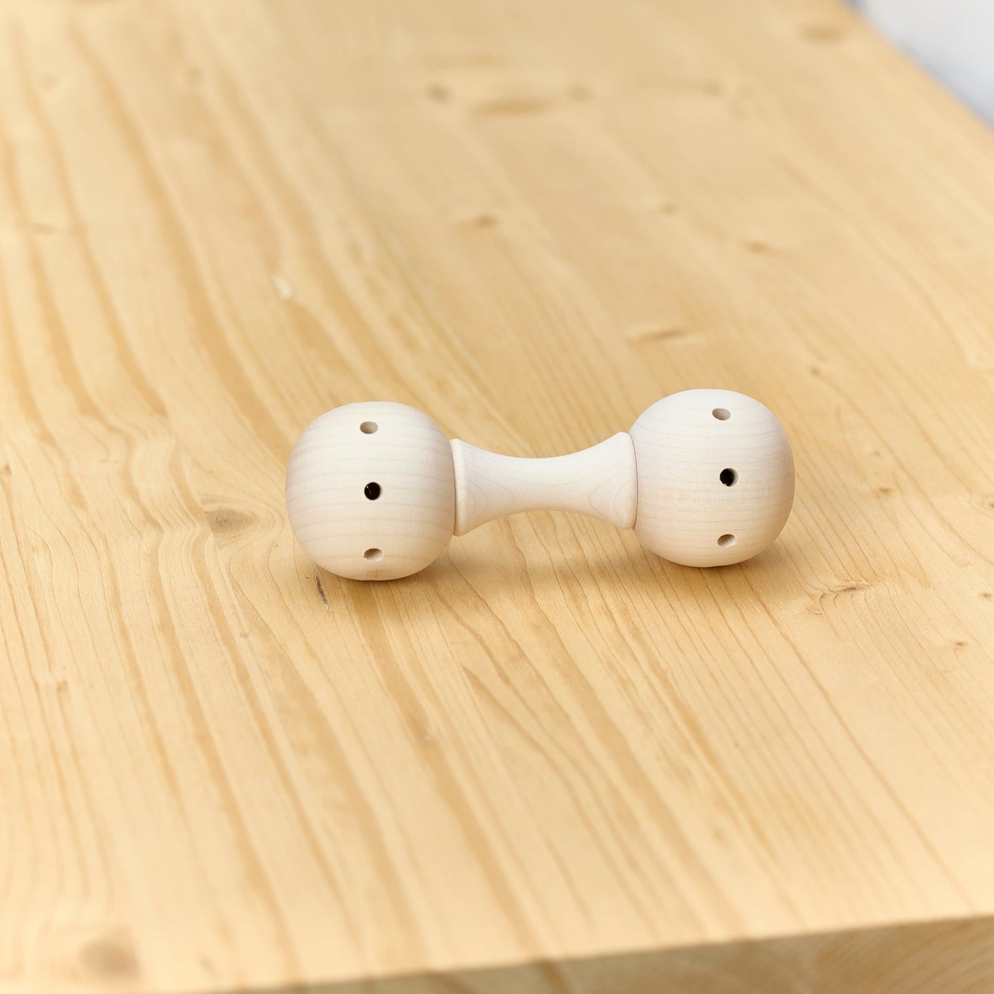Babyrassel mit Glöckchen, montessori-inspiriert